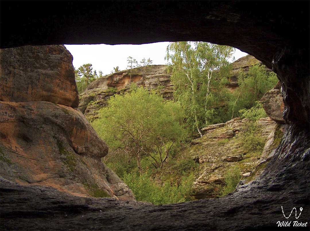 Three Caves in the Karkaraly Mountains